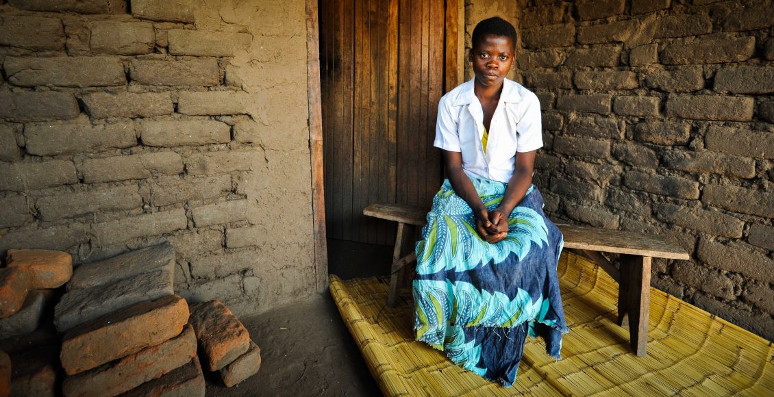Charity Lloyd, 19. She got married at the age of 17 after her mother died during heavy flooding in the Nsanje district of Malawi, an event blamed by some experts on changing climate. Her father had died a few years earlier. She lives in Malakeza village in the Nsanje district of Malawi with her husband Isaac Chuva, 23 and their daughter Eveless, one and a half years old.